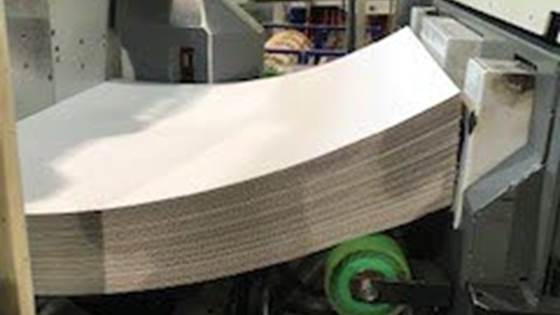 UnWarp: Understanding warping corrugated board with machine learning