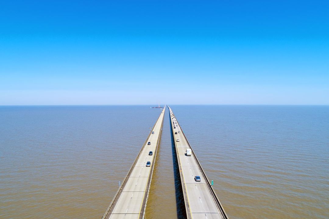 Very long bridge crossing a large body of water.