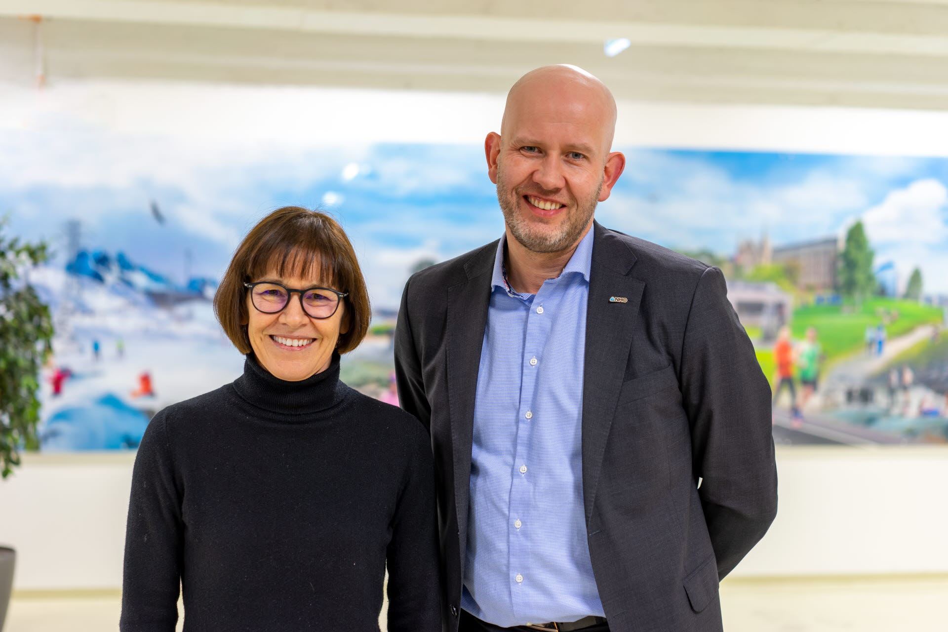 - Mona Mølnvik (NCCS Centre Director) and Tord Lien (Chair of the NCCS Board)