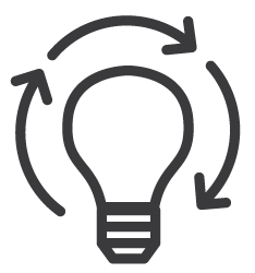 Lightbulb with arrows around it