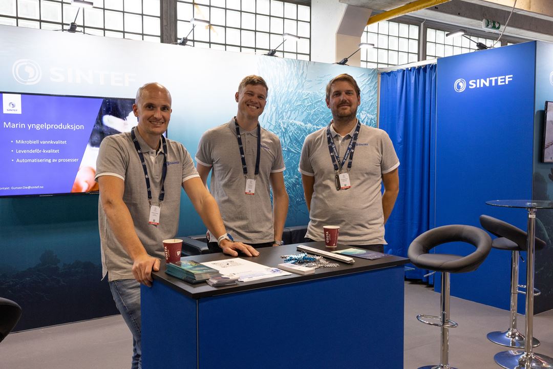 Andreas Misund, Herman B Amundsen og Sveinung Ohrem på SINTEF Ocean stand.