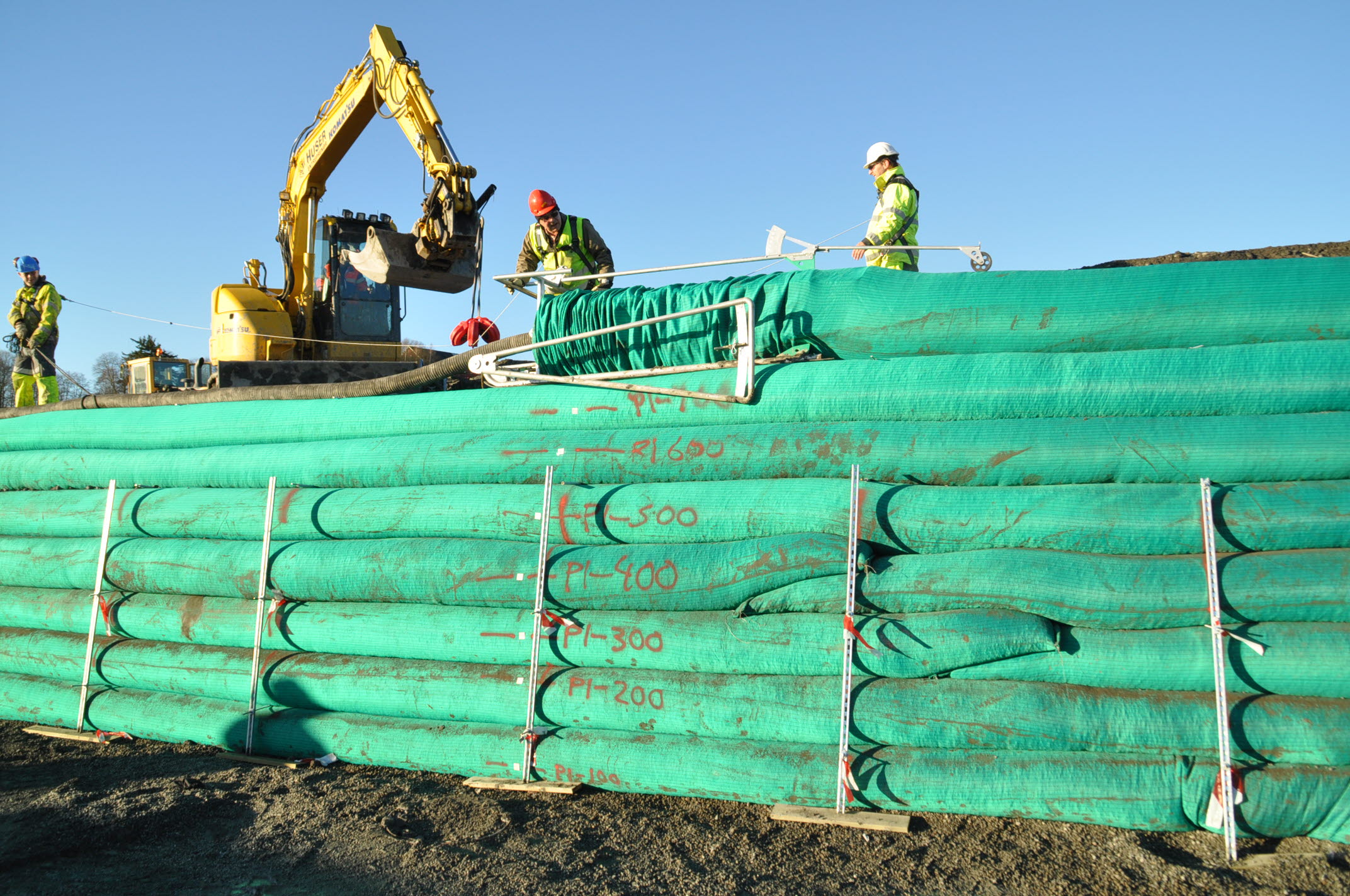 “Blowing” a slope into place