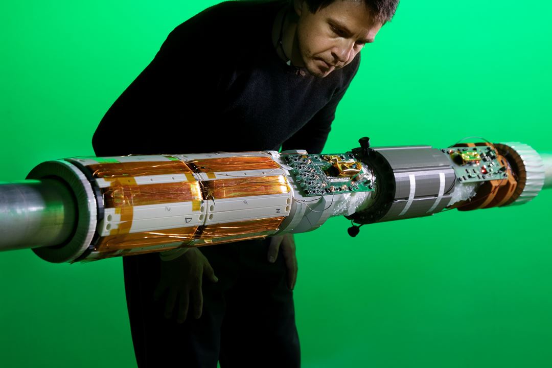 Caption: Researcher, Alessandro Liberale, with an Active Magnetic Ranging tool that was developed in our lab