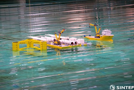 floating harbour barge set up in the ocean basin