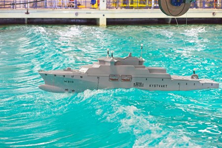 Model of coast guard ship in the ocean basin