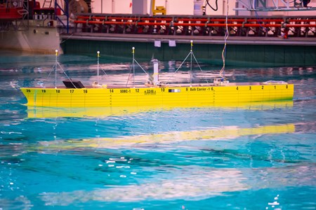yellow ship model in the ocean basin