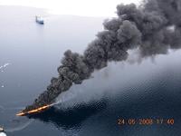 Uncontained in-situ burning using chemical herders during field trial utside Svalbard May 2008