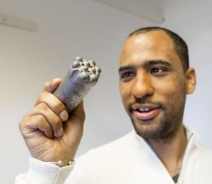 SINTEF’s project manager Alexandre Kane checks out a drill-bit that the Swedish company Sandvik has developed for mining operations. In future commercial drilling for deep geothermal energy, wells may need to be as much as a metre in diameter. Photo: SINTEF/Thor Nielsen