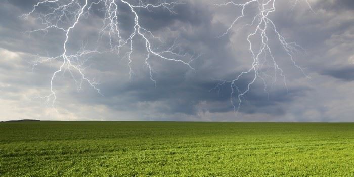 Avoid flat and open landscapes, and let go of your golf clubs. Holding a metal golf club will increase the risk of your being struck. Photo: ThinkStock.