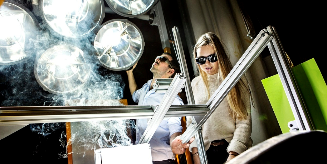 This photograph shows researchers working with an artificial "sun" in their quest to build a new solar cooker. We liked it so much we've made it our main Facebook page photo. Photo: Geir Mogen