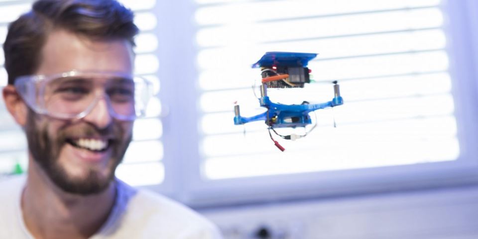 Researcher Jackob Høgenes at SINTEF Digital is working with drones - however, this one only flies indoors. Photo: Werner Juvik / SINTEF.