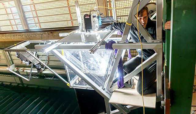 Researcher working on experimental setup