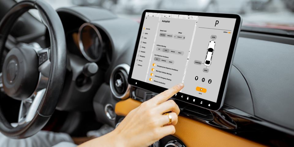To design a car with devices that prevent us from keeping our eyes on the road at all times is not a good idea. The author of this article argues that it drains the capacity of those centres of the brain that we need to drive safely. Stock photo: RossHelen/Shutterstock