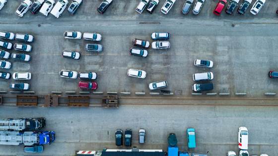 Cars are too wide and parking spaces too narrow