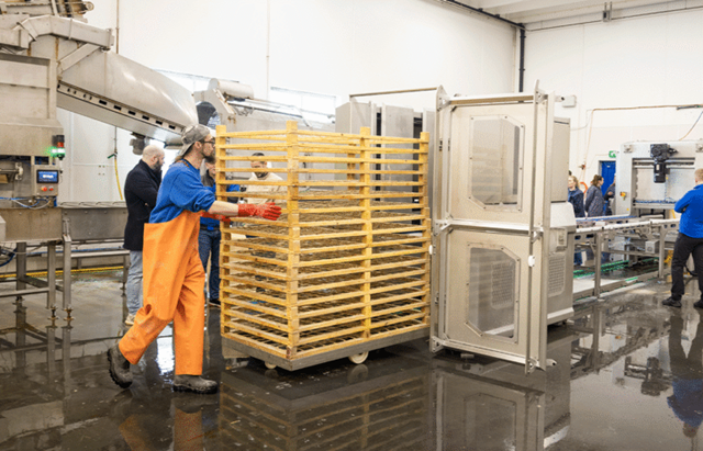 Drying trolley being pushed into machine