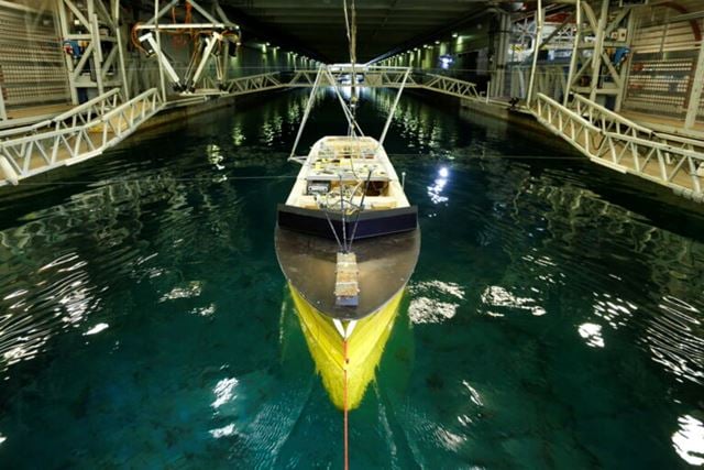 Model boat in a tow tank