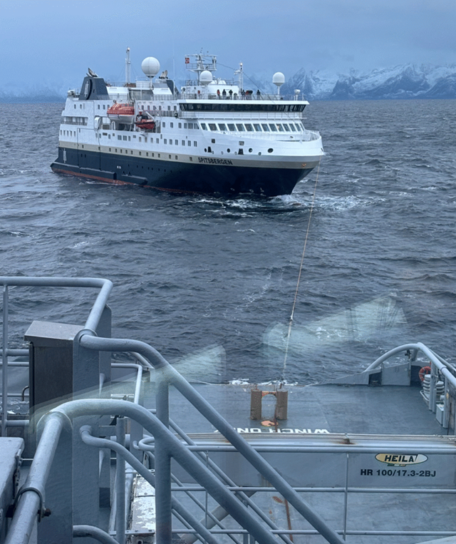 The cruise ship being towed